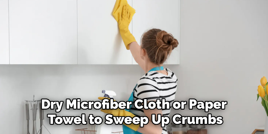 Dry Microfiber Cloth or Paper 
Towel to Sweep Up Crumbs