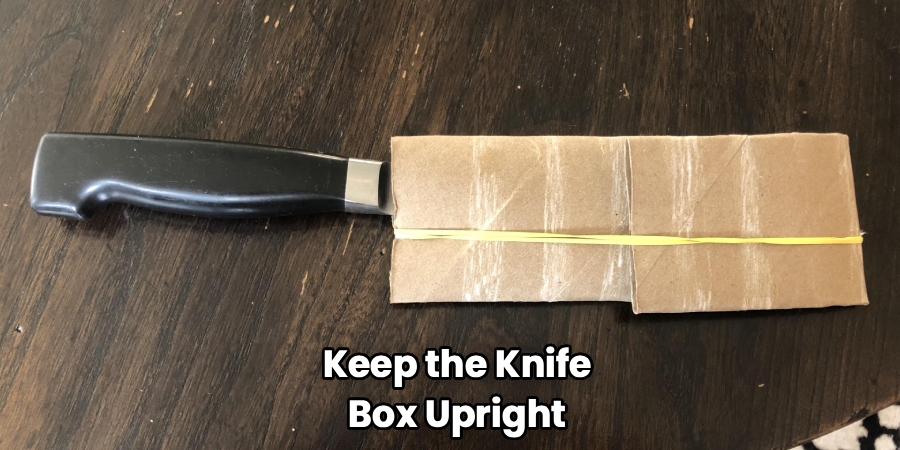 Keep the Knife
Box Upright