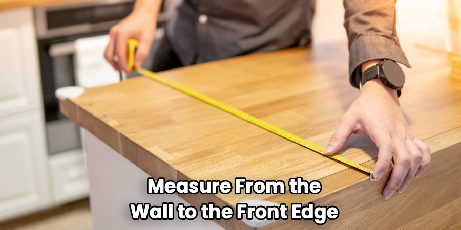 Measure From the
Wall to the Front Edge