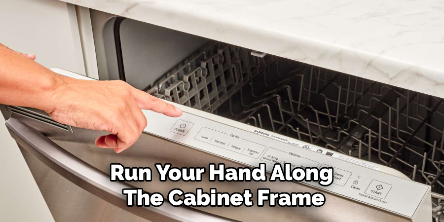 Run Your Hand Along 
The Cabinet Frame