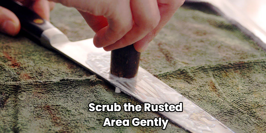 Scrub the Rusted
Area Gently