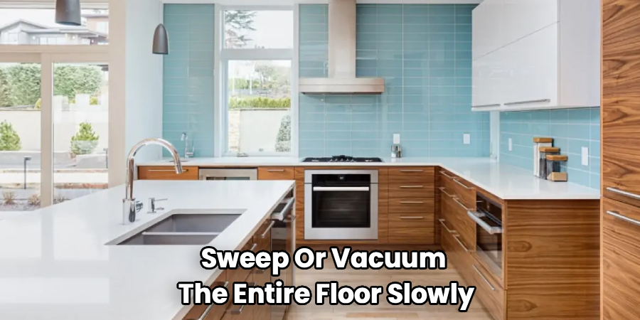 Sweep Or Vacuum
The Entire Floor Slowly