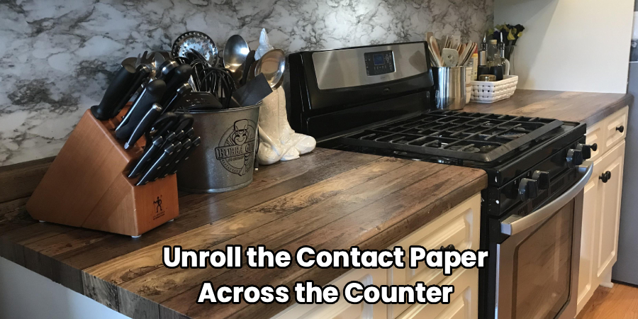  Unroll the Contact Paper 
Across the Counter