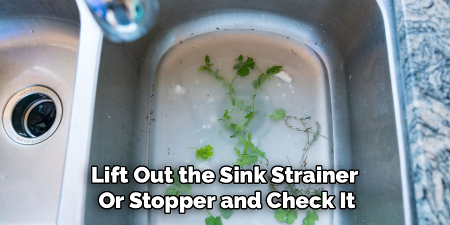 Lift Out the Sink Strainer
Or Stopper and Check It