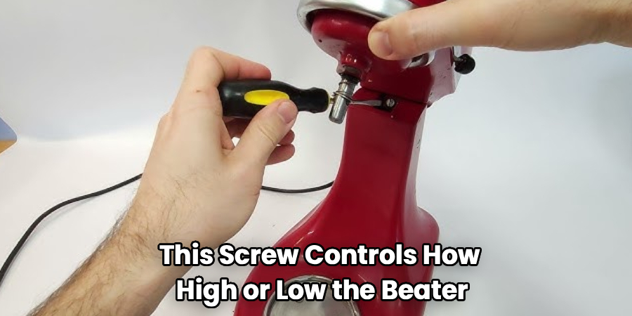 This Screw Controls How
High or Low the Beater