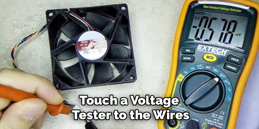 Touch a Voltage 
Tester to the Wires