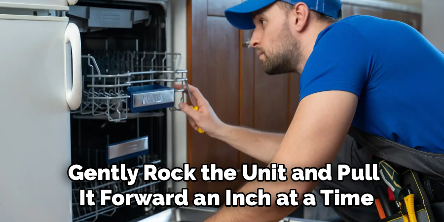Gently Rock the Unit and Pull
 It Forward an Inch at a Time