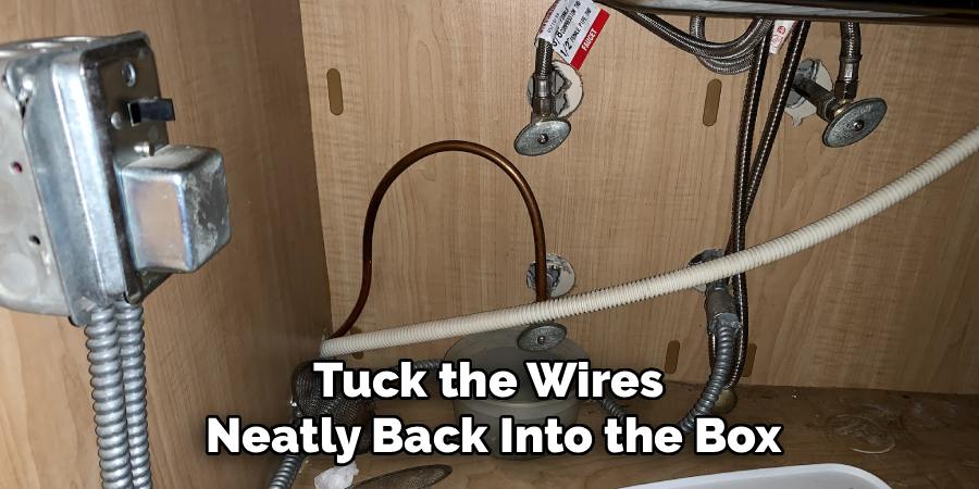 Tuck the Wires 
Neatly Back Into the Box