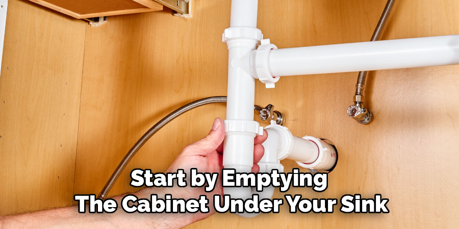 Start by Emptying
The Cabinet Under Your Sink