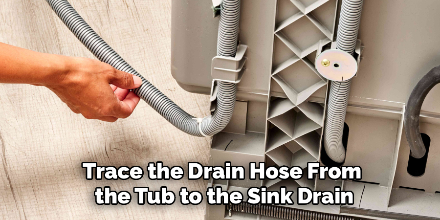Trace the Drain Hose From
 the Tub to the Sink Drain