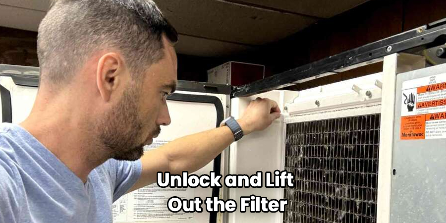 Unlock and Lift 
Out the Filter