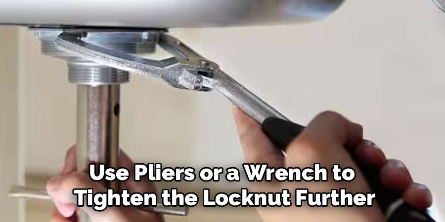 Use Pliers or a Wrench to
Tighten the Locknut Further