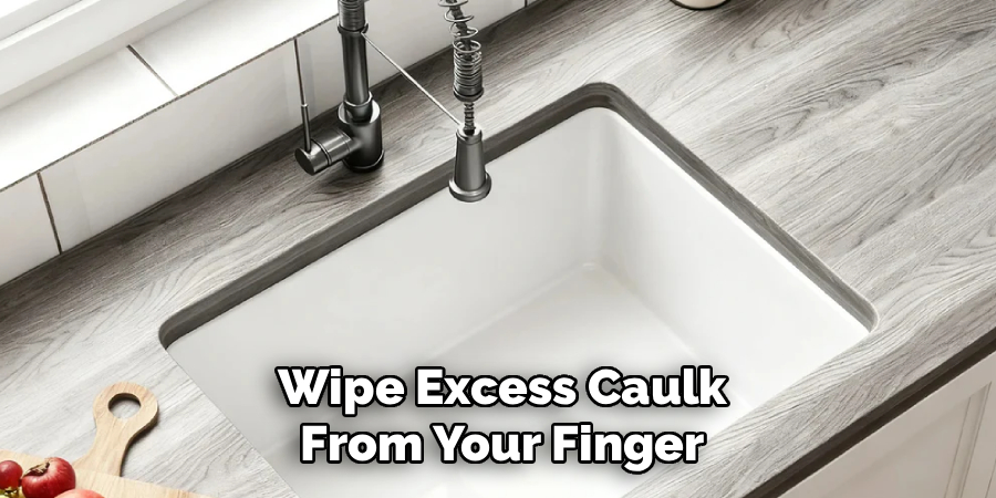 Wipe Excess Caulk
From Your Finger
