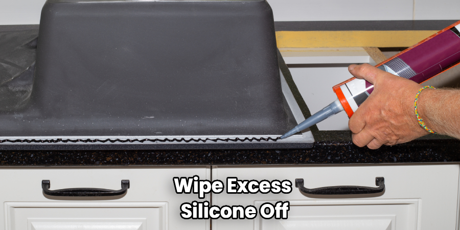 Wipe Excess
Silicone Off