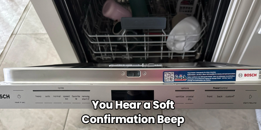 You Hear a Soft
Confirmation Beep
